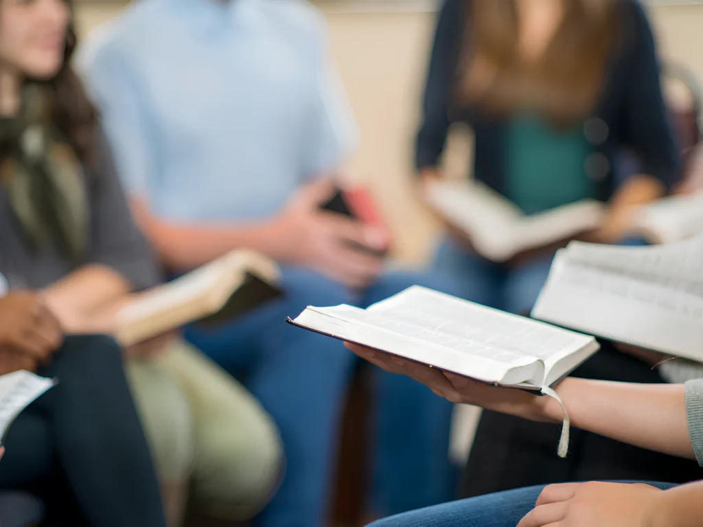 An image showing a group of people studying the Bible together.