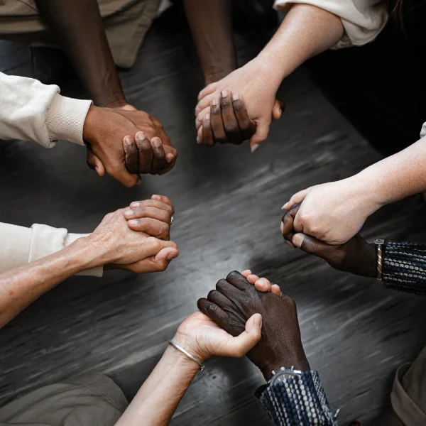 Image of adults in a small group.